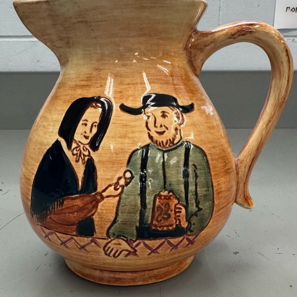 Pennsylvania Pottery Pitcher wit Folk Art Amish Couple #amish #pottery #pretzal